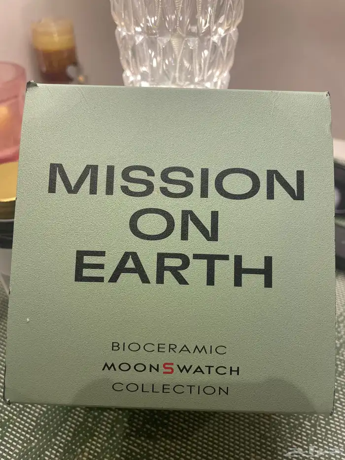 ساعة اوميغا سواتش كوكب الارض   Mission on Earth 0