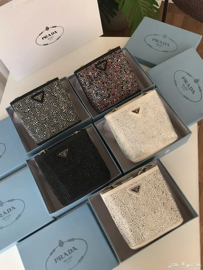 شنط ماركة ميو ميو مع جميع الملحقات 73