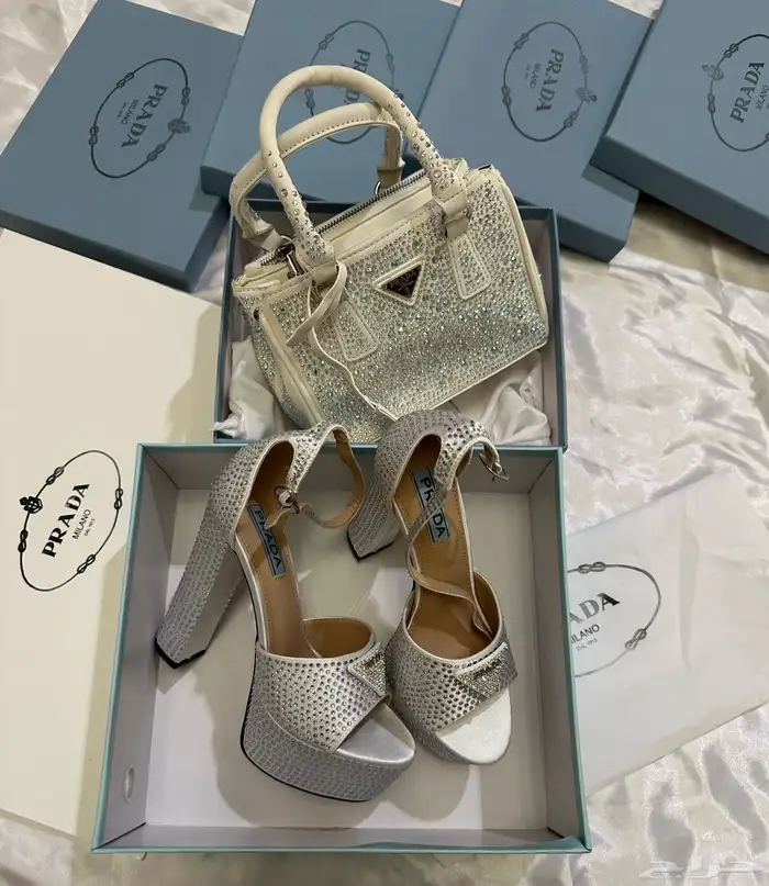 شنط ماركة ميو ميو مع جميع الملحقات 57