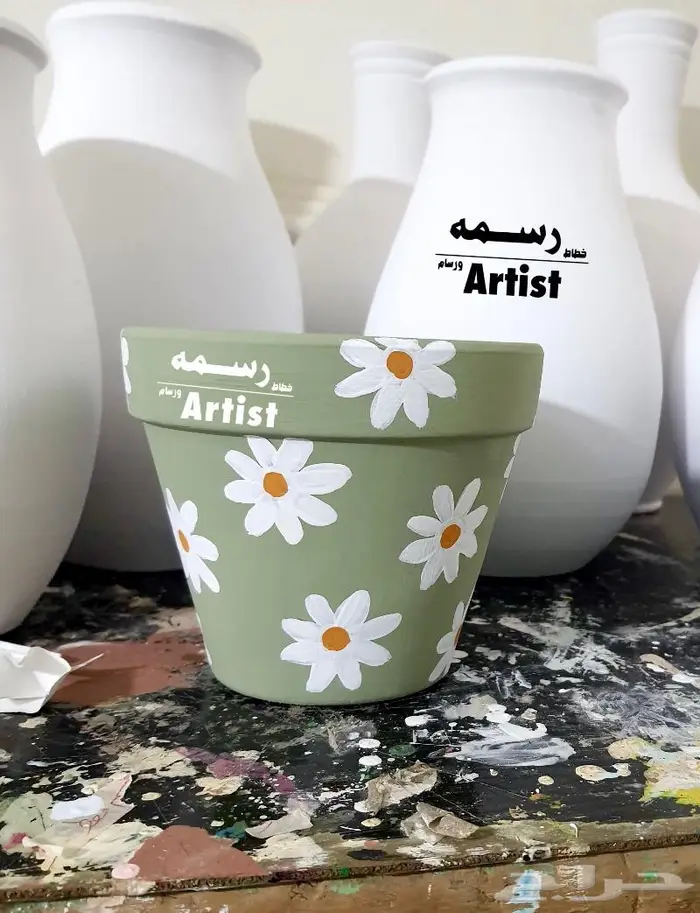 خطاط ورسام - رسم و تلوين الفخار - كتابه علي الفخار - جده 3