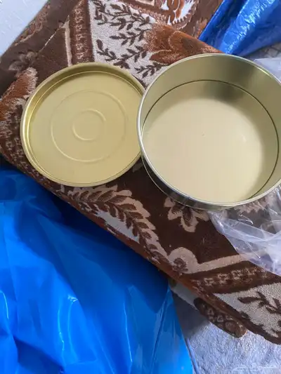 علب تمر. واحد كيلو ومكبس. يدوي عدد 3. والعلب. 50 2