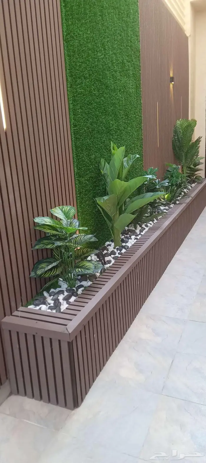 تنسيق حدائق التيل طبيعي عشب صناعي 0