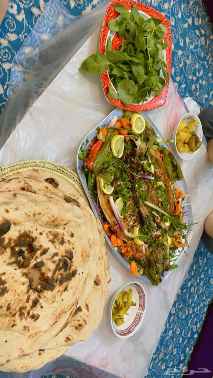 لدينا سمك مشوي مسكوف ع الطريقه العراقيه وخبز تنور 5