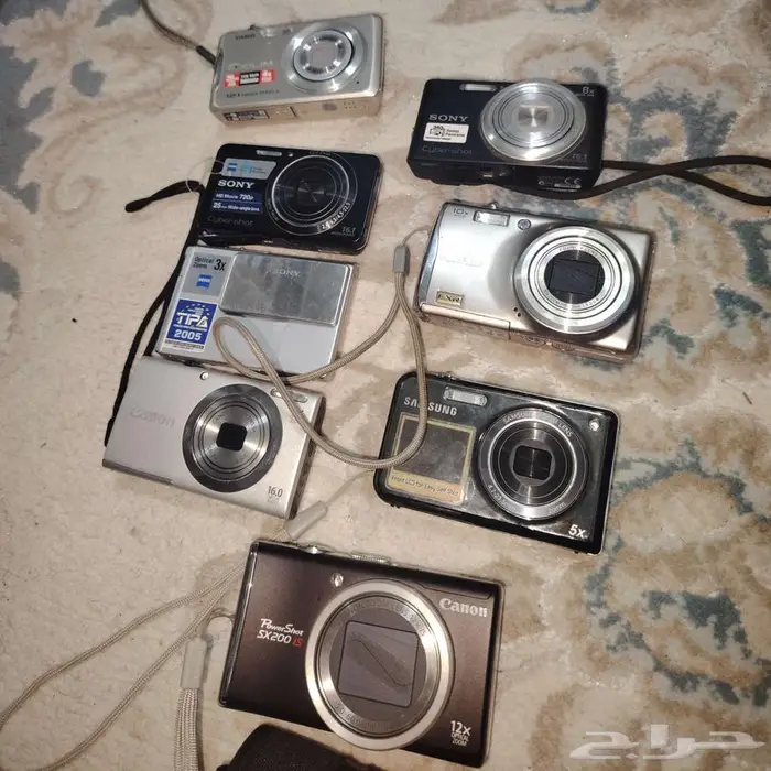كاميرا كانون و سوني و سامسونج و فوجي ديجيتال 0