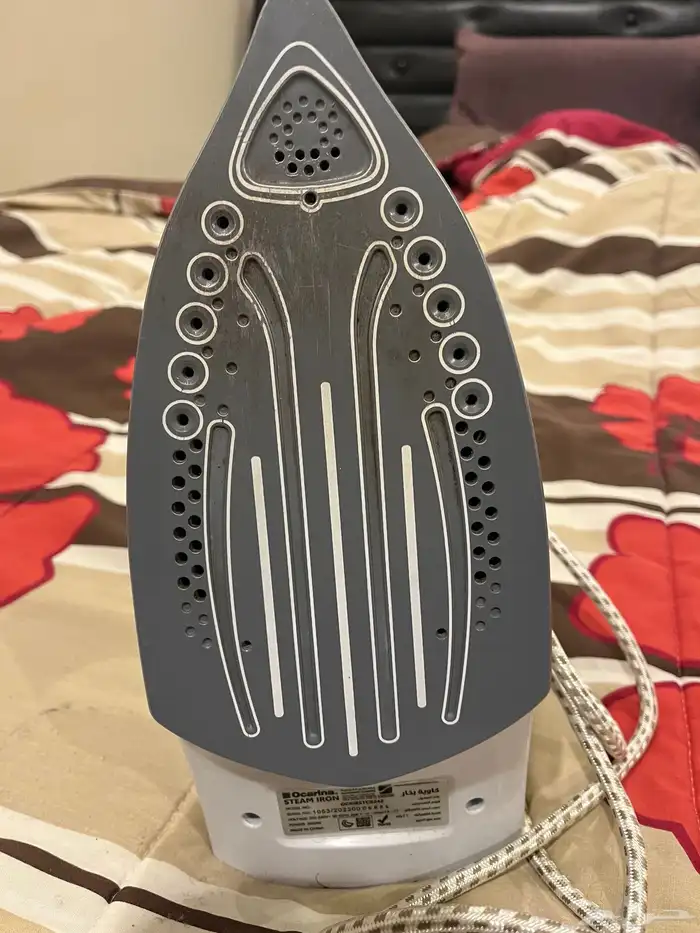 مكواة ملابس 0