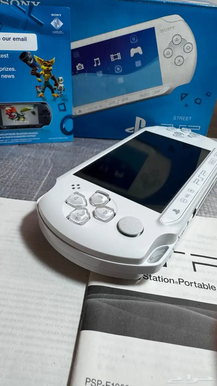 جهاز سوني PSP E1002 - STREET بكرتونه أصلي مع 5 أشرطة أصلية 2