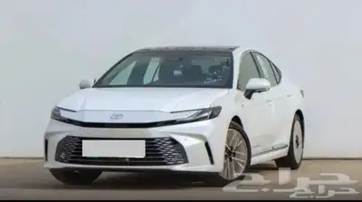 تويوتا كامري لومير هايبرد 2025 ابيض لؤلؤي 1