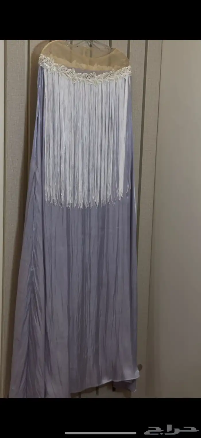 فساتين للعيد وجلابيه للحوامل من مصممات 2