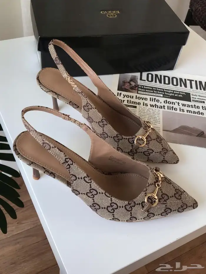 شنط وشوزات ماركه مختلفه 21