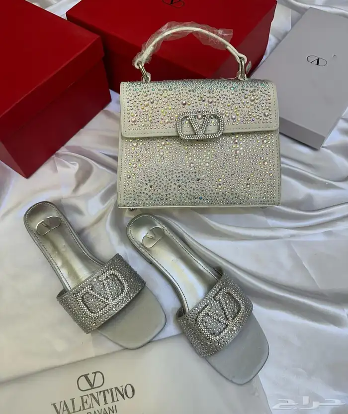 شنط شانيا وسان لوران ولويس فيتون 21