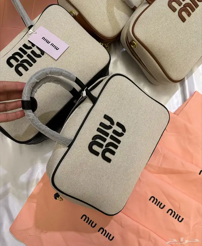 شنط شانيا وسان لوران ولويس فيتون 81