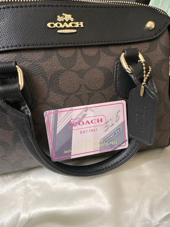 شنطة coach بني غامق 1