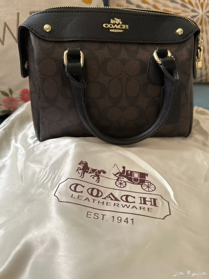 شنطة coach بني غامق 0