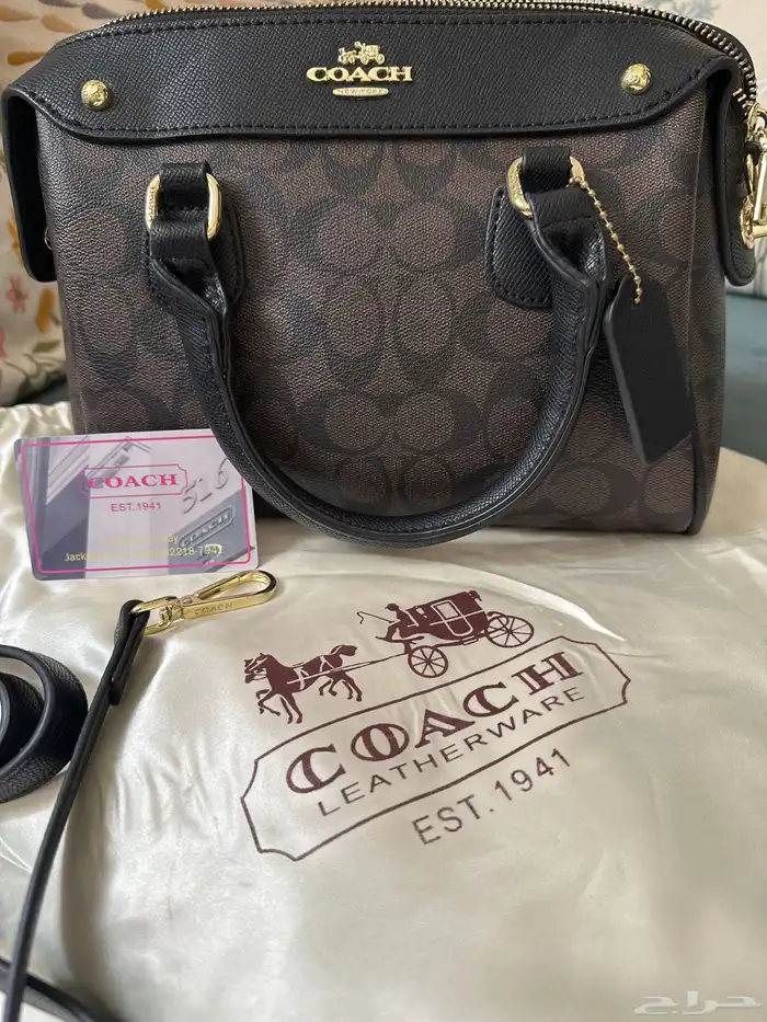شنطة coach بني غامق 2