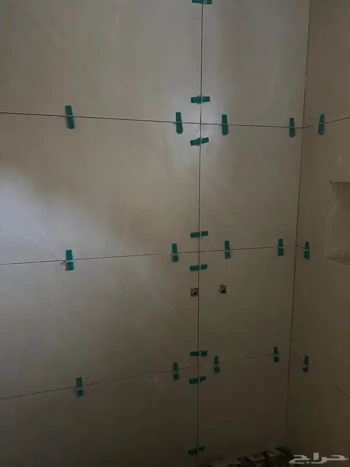 Tile layer Pakistani ceramic tiles AlBaha owner 2