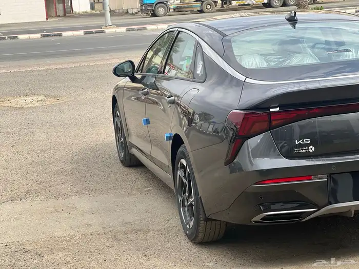 كيا K5 مطور 2026 لون رمادي وكيل الجبر 7