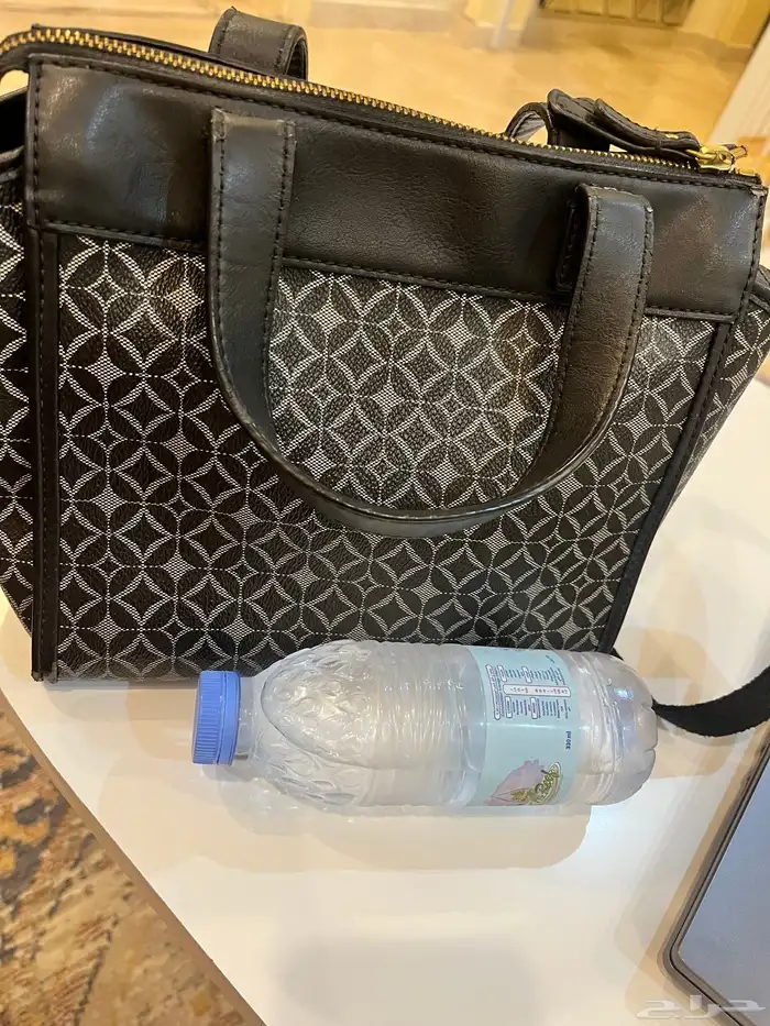 شنطة ماركةFossil اصلي مستعمل به عيوب بسيطه 4
