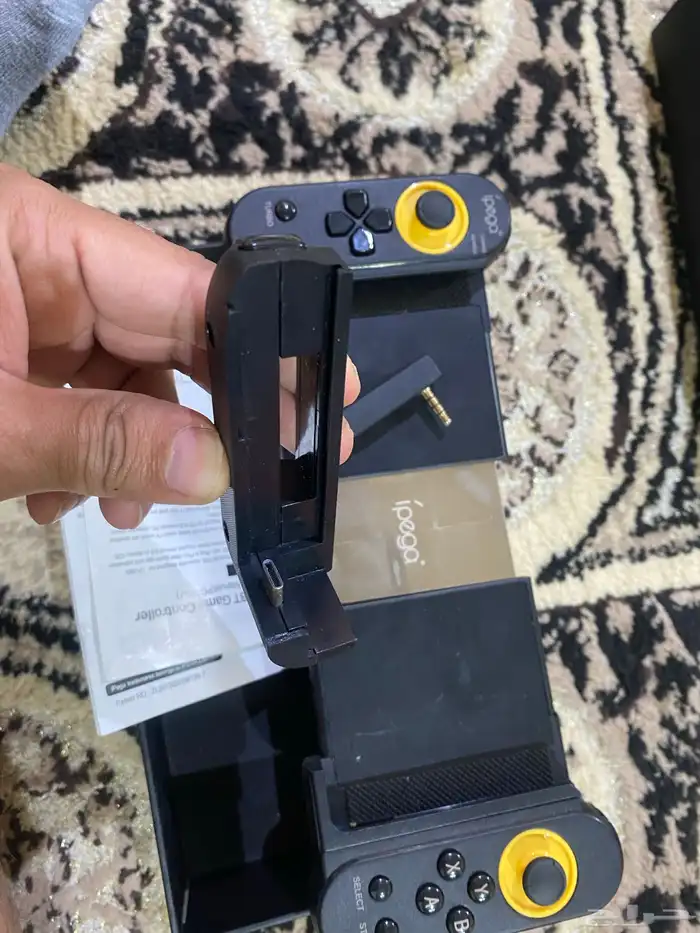 يد تحكم للجوال بحالة ممتازة 1