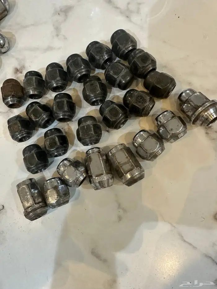 صواميل اصليه نيسان باترول فتك قطع 27