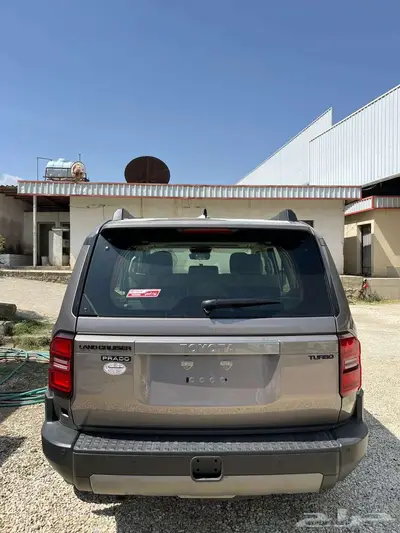 تويوتا برادو TXL3 بنزين 2025 ذهبي غامق 2