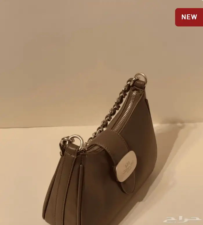 كعوب وشنط ماركة كوتش و ميو ميو 3