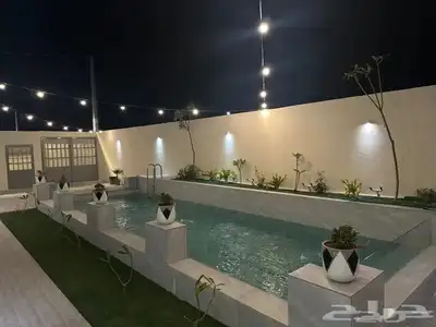 شاليه فاخر غرب بريده جديد و بمسبح خارجي مميز 0