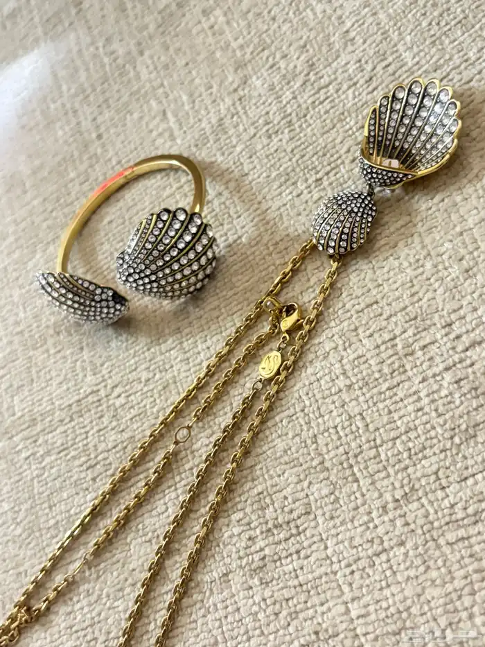 سواره وسلسال ماركة سوار فسكي عاجل 0