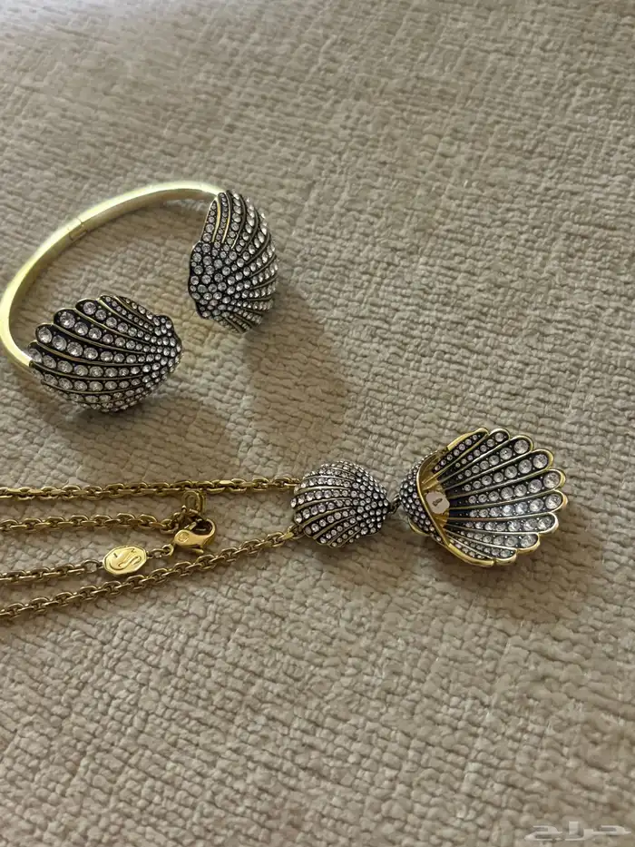 سواره وسلسال ماركة سوار فسكي عاجل 1