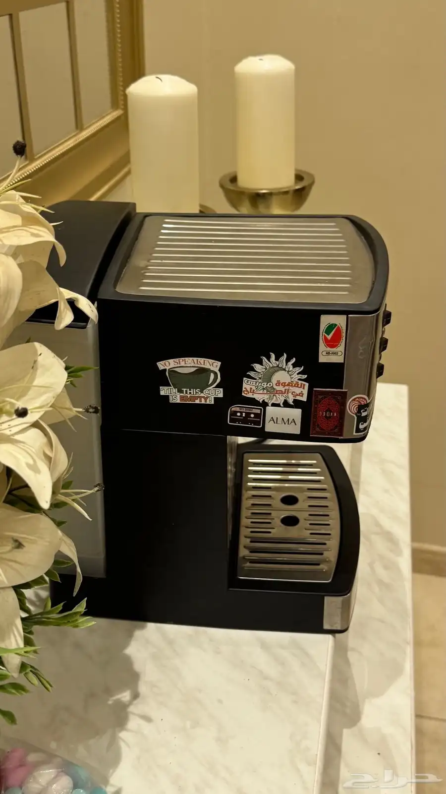 ماكينة اسبريسو ساتشي معي له سنه و نص سبب البيع شريت غيره 3