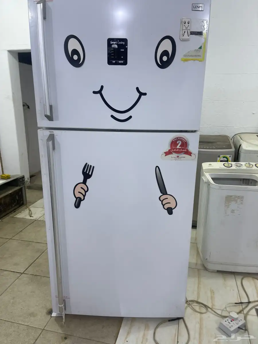 ثلاجة مع فريزر 1