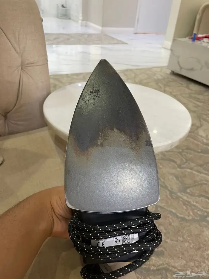 مكواة ملابس 0