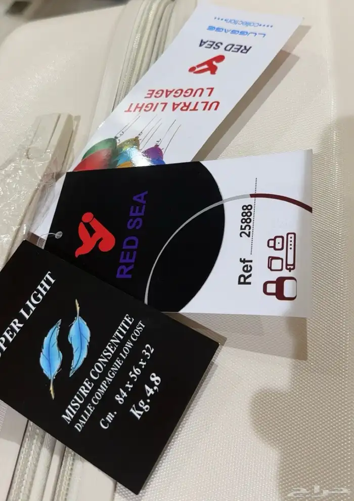شنطة سفر بيضاء اصليه كبيره جديده لم تستخدم مقاس 32 56 84 2
