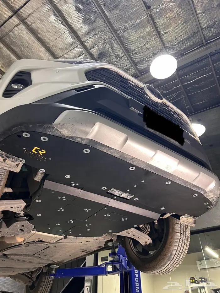 رف تخزين علوي في الشنطة و صاجة حماية اسفل المكينه راف فور 9