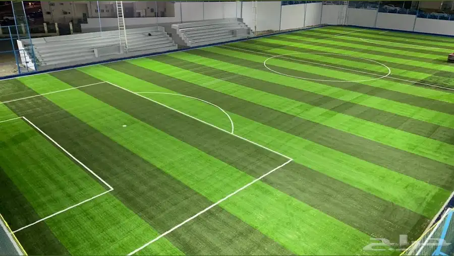 تنفيذ ملاعب العشب الصناعي ومكينة فرد العشب مكينة (SMG) 16