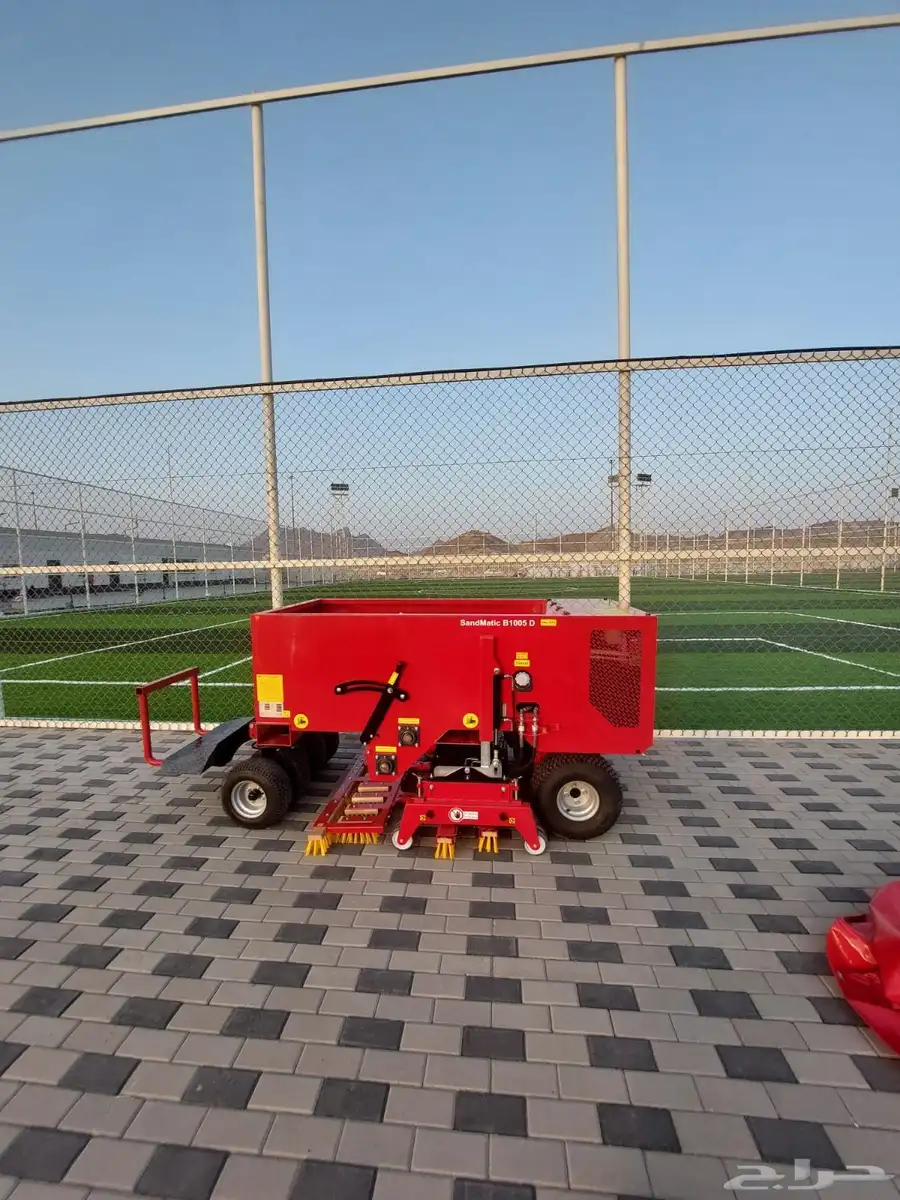 تنفيذ ملاعب العشب الصناعي ومكينة فرد العشب مكينة (SMG) 0