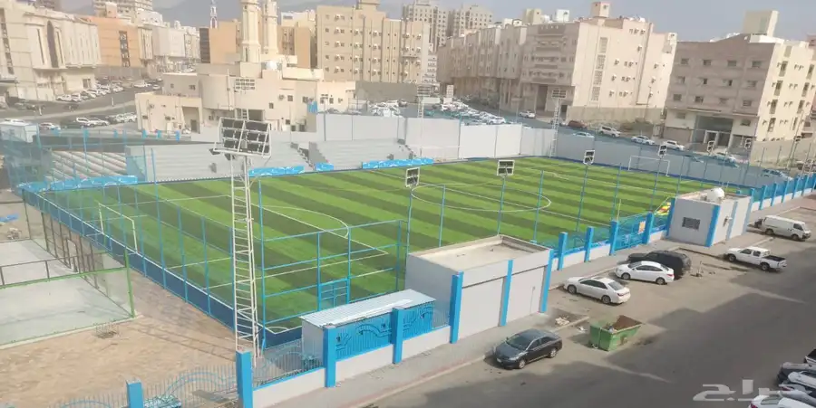 تنفيذ ملاعب العشب الصناعي ومكينة فرد العشب مكينة (SMG) 14