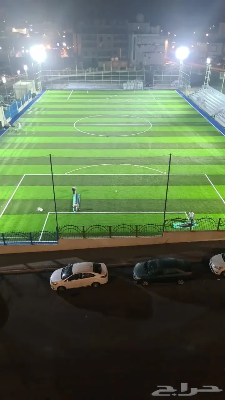 تنفيذ ملاعب العشب الصناعي ومكينة فرد العشب مكينة (SMG) 12