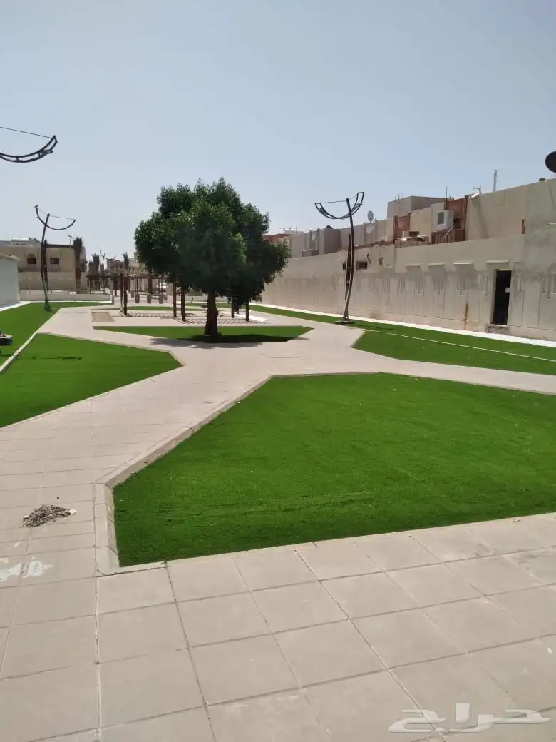 تنفيذ ملاعب العشب الصناعي ومكينة فرد العشب مكينة (SMG) 4
