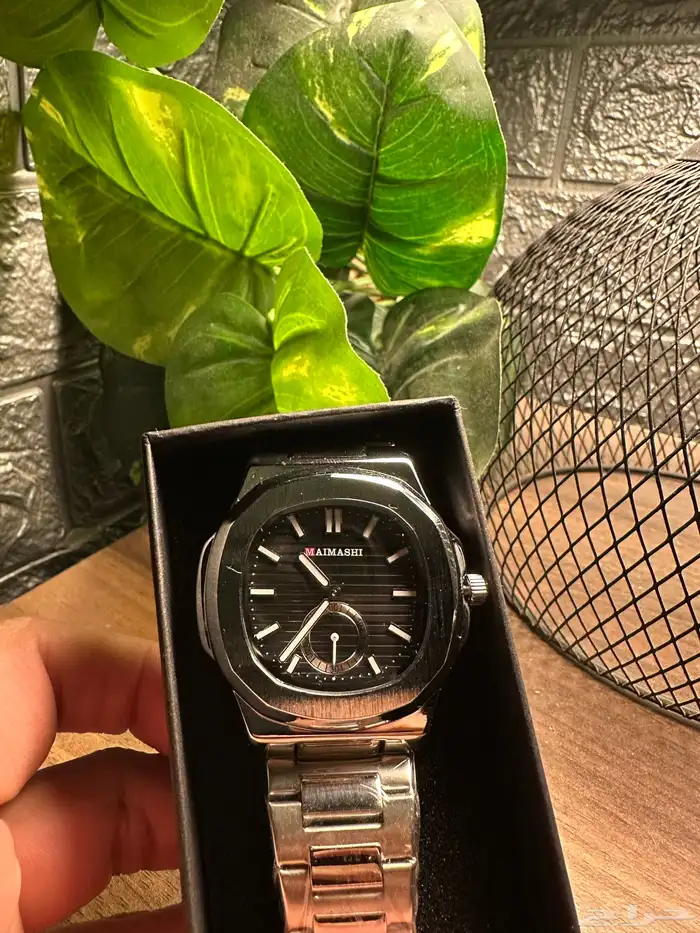ساعة شبيهة باتيك فيلب نوتلس Patek Philippe Nautilus 5