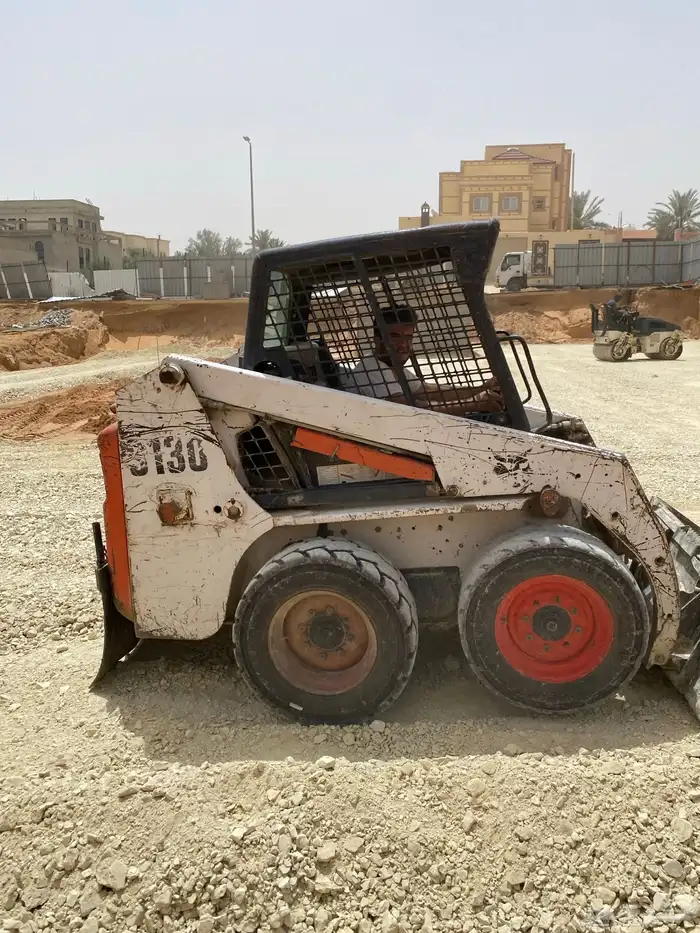 ايجار بوكلين توريد صبيز  بحص  رمل ابيض 15