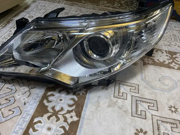 شمعة كامري 2012 2015 اصلي وكاله يسار 0