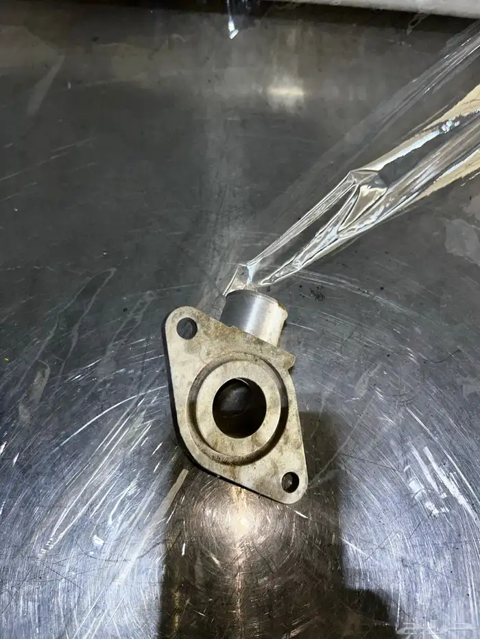 كوع مني كوبر Engine Coolant Outlet Flange 70 2