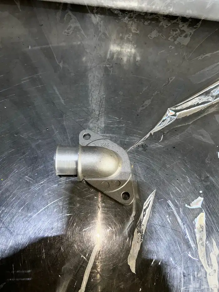 كوع مني كوبر Engine Coolant Outlet Flange 70 1