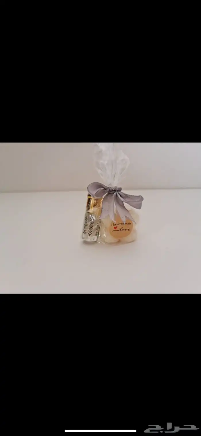 شمع مغلف مع شريطة للمواليد أو توزيعات حسب الرغبة اللون 0