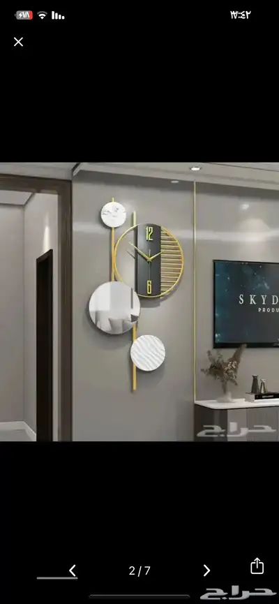 ساعة جدارية عصرية بتصميم أنيق وفريد 0