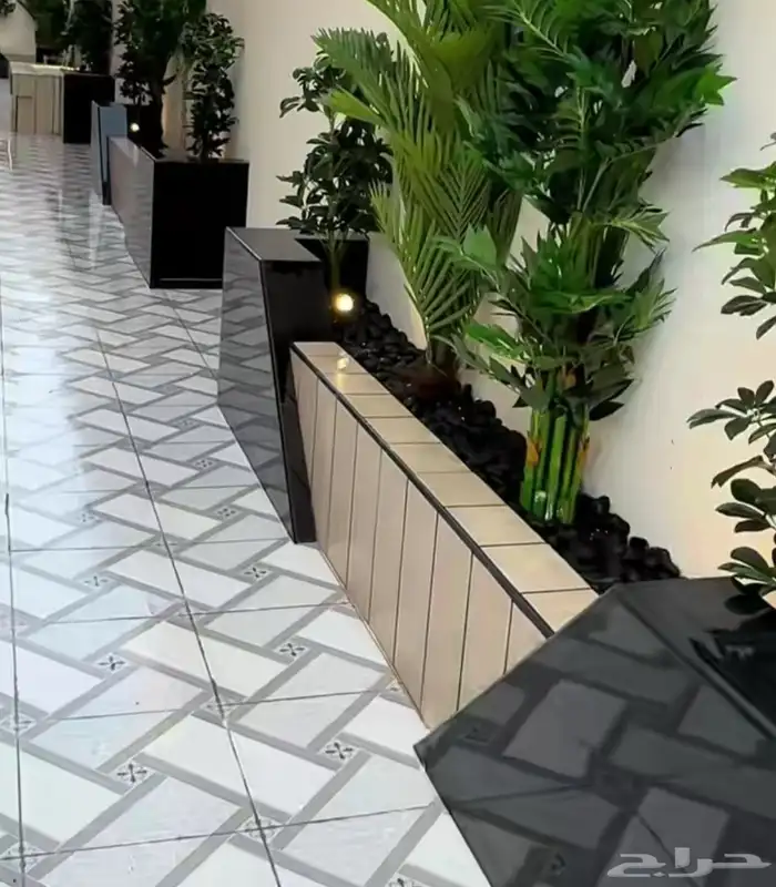 فني تنسيق الحدائق 55