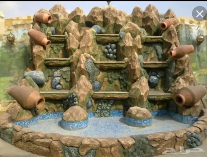 فني تنسيق الحدائق 56