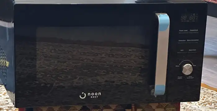 مكروييف من نون 900 واط جديد 0
