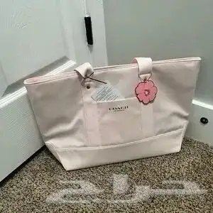 شنطة توت باق ماركة كوتش اصليه 100 جديدة 2
