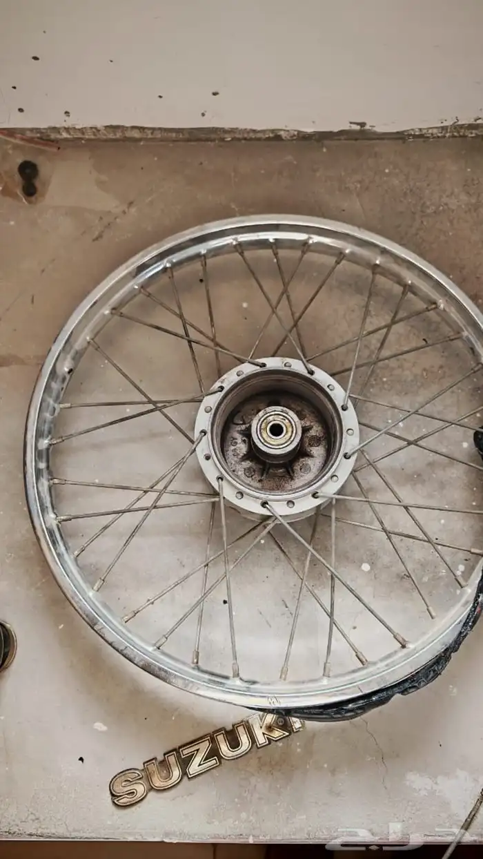 قطع غيار سوزوكي AX100 28